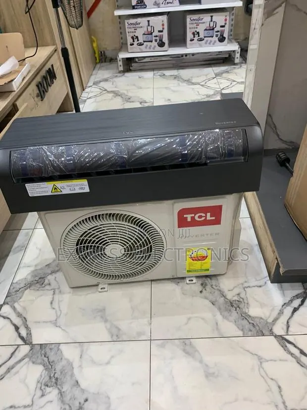 Call and Order for TCL 1.5hp Split Inverter Wooden Like Dark Grey · Photo 1