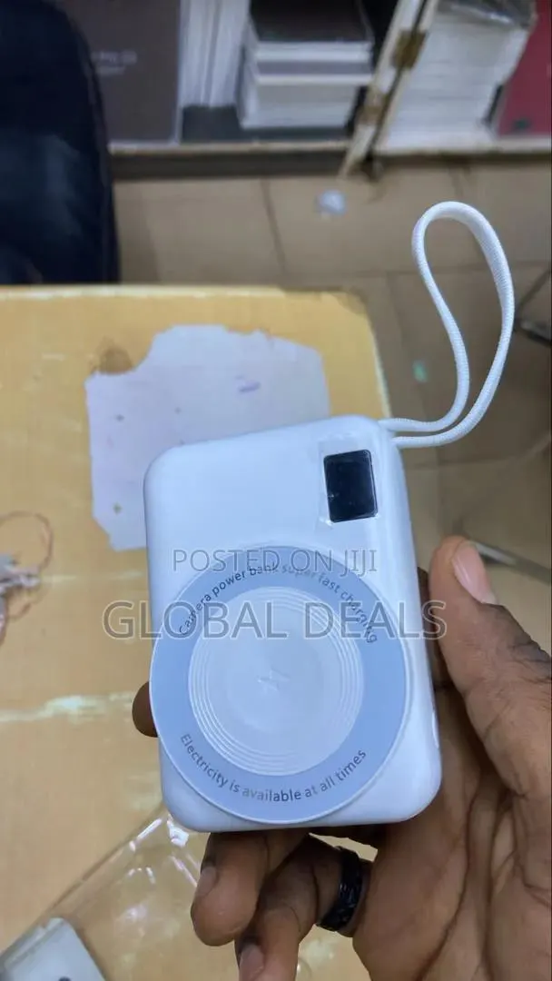 Camera Shaped Fast Charging Wireless Powerbank With External Cables · Photo 1
