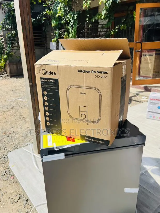 Text Us Fir Your Hot and Cold Water Heater Midea 10l · Photo 1
