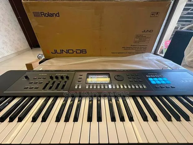 Roland Juno-D6 61-Key Synthesizer Plus Free Keyboard Stand · Photo 1
