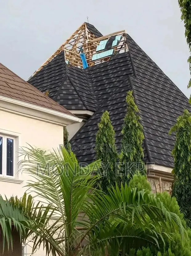 Black Bond Euro Tiles and Rain Gutter · Photo 1