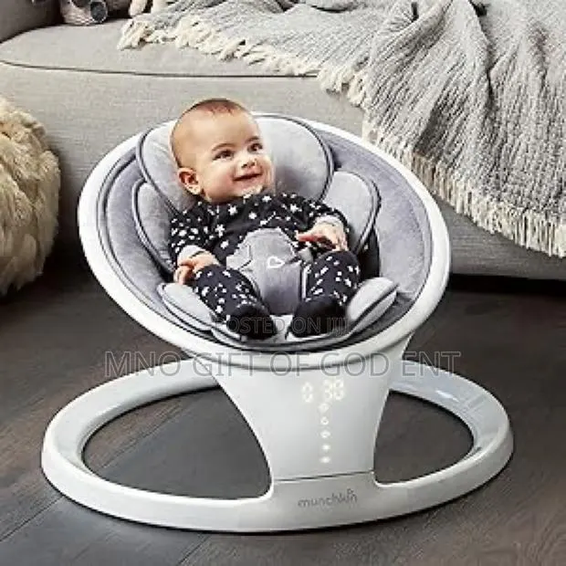 Munchkin Electric Baby Swing, Portable and Lightweight Bluetooth Swing · Photo 1