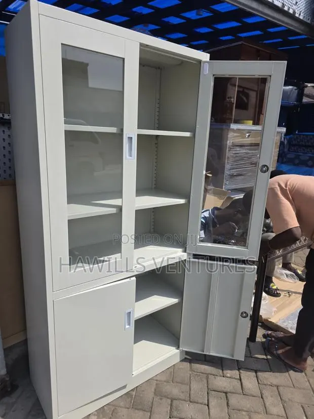 Light Gray Zuo Modern Metal Cabinet With Glass Door and Solid Metal. · Photo 1