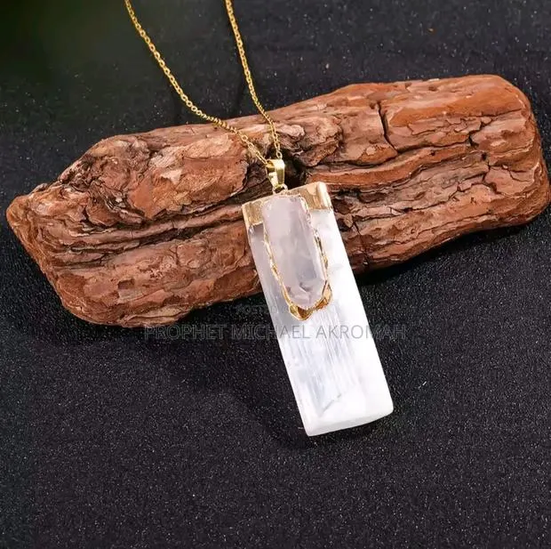 Raw Natural Crystal Point Pendant · Photo 1