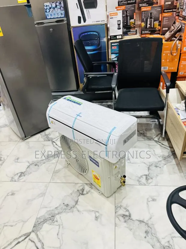 Available Now White Dual Inverter Nasco (1.5)Hp” · Photo 1