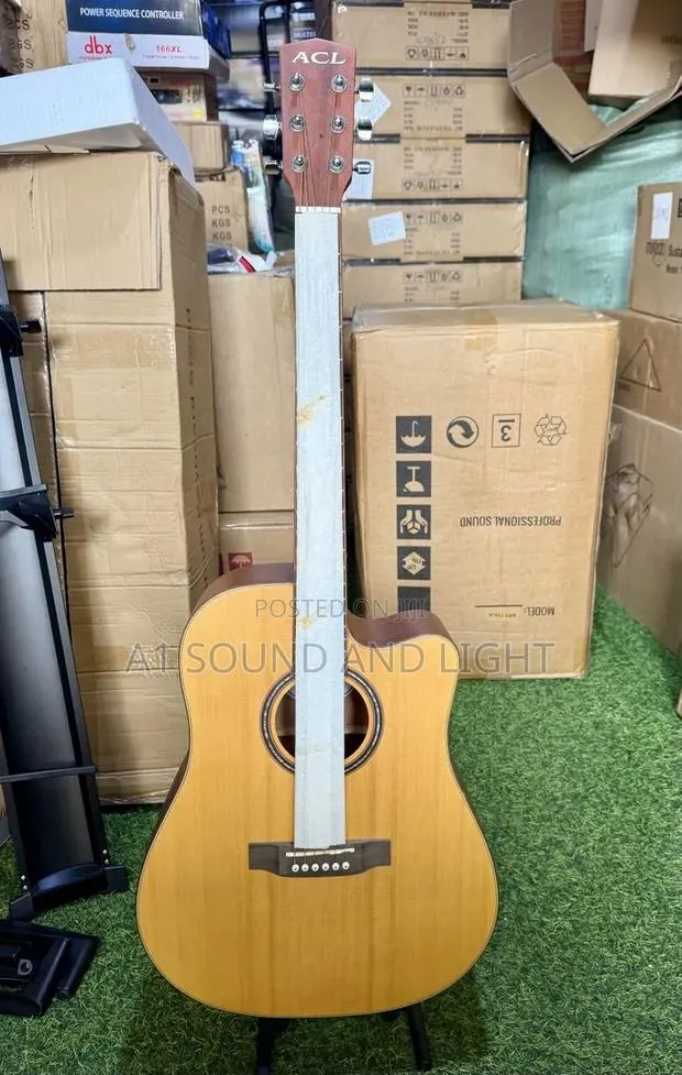 ACL 6 Strings Acoustic Guitar With Guitar Bag and Strap · Photo 1