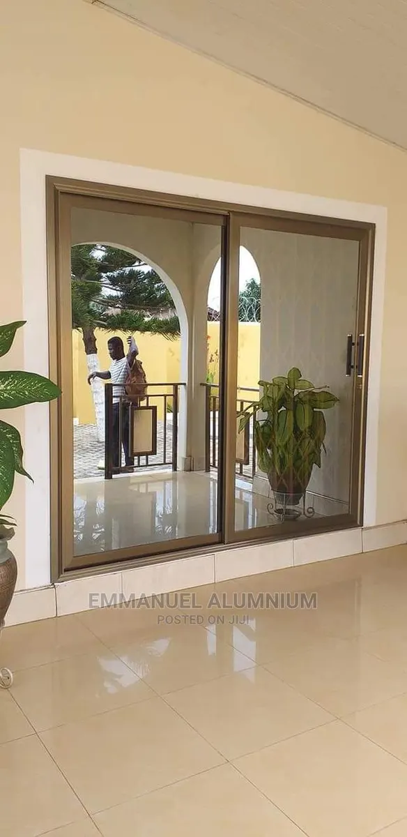 Champagne Italian Aluminum Sliding Door · Photo 1
