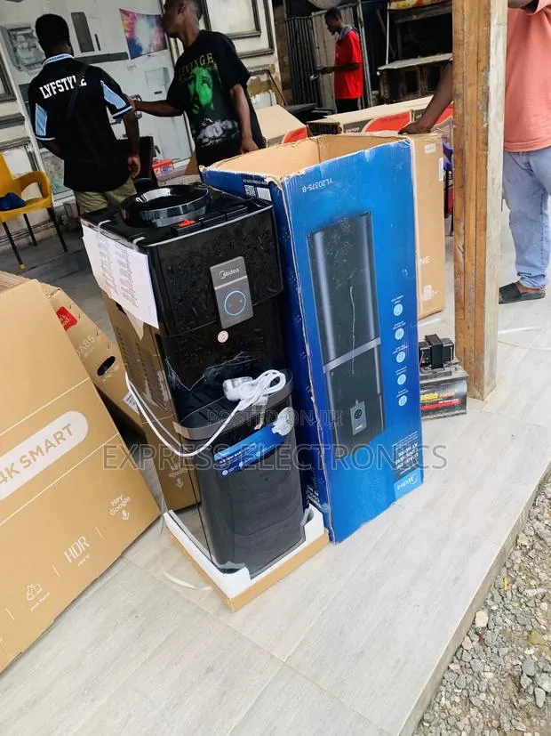 Get a New Midea Water Dispenser 30L Black With Fridge · Photo 1