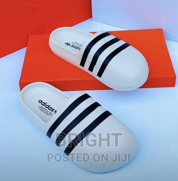 Adidas Slippers And Nike Slippers · Photo 1