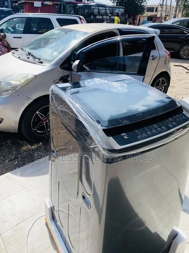 Place Your Order TCL 18kg F318tlg Top Load Washing Machine Gray · Photo 1