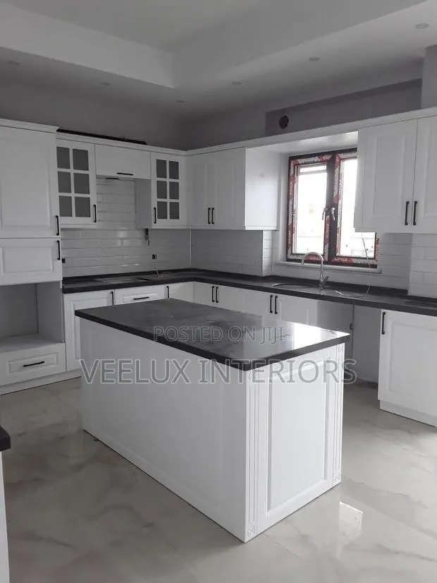 Solid Wood Kitchen Cabinets With Fridge Dishwasher · Photo 1