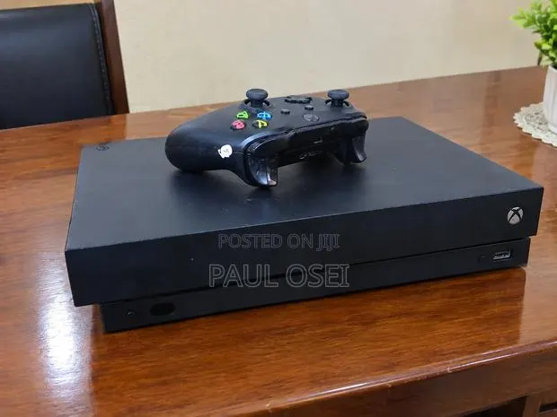 Xbox One X With 7 Games Installed · Photo 1