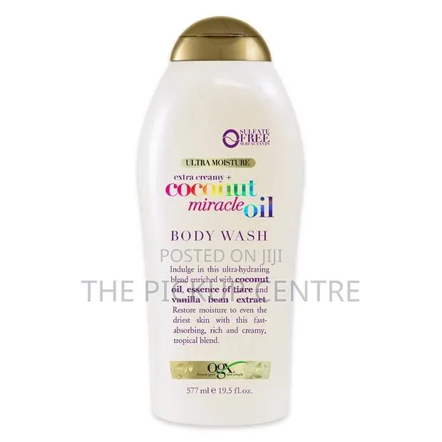 OGX Extra Creamy +Coconut Miracle Oil Body Wash &Scrub 577ml · Photo 1
