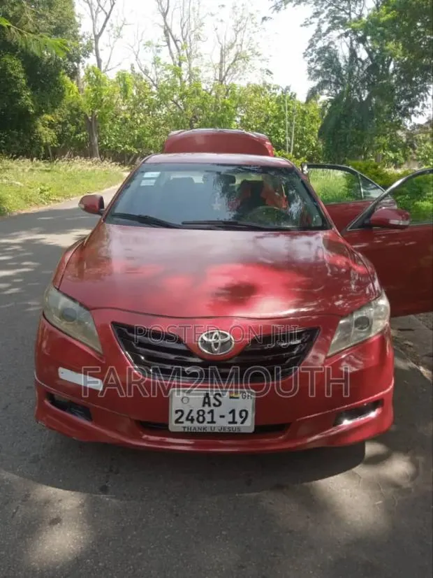 Toyota Camry LE 4dr Sedan (2.4L 4cyl 5A) 2009 Red · Photo 1