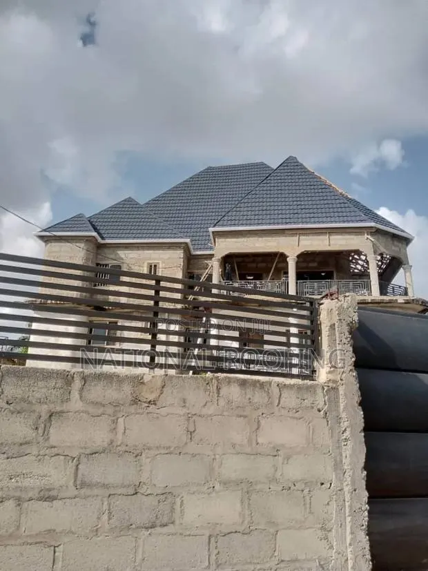 Installation of Stone Coated Roofing Sheet · Photo 1