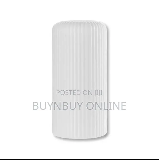 Plastic Flower Vase With Ceramic Texture Effect · Photo 1