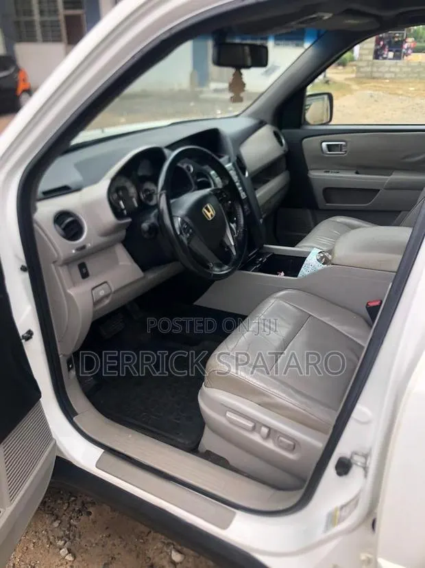 Honda Pilot EX-L 4dr SUV 4WD (3.5L 6cyl 5A) 2011 White · Photo 1