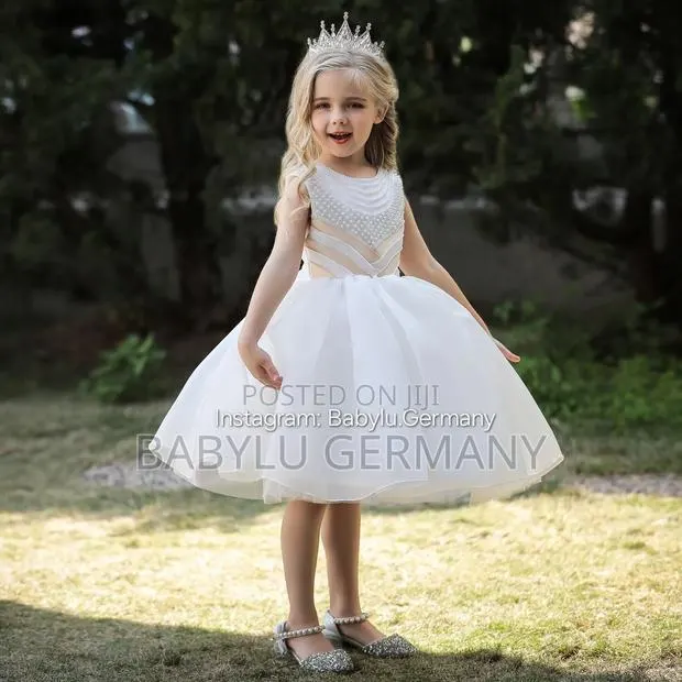 Unique White Dress for Children 5 to 11 Years Old · Photo 1