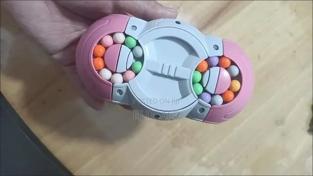 UFO 8 Sided Rotating Magic Beans Cube Fidget Toy (Age 3+ · Photo 1
