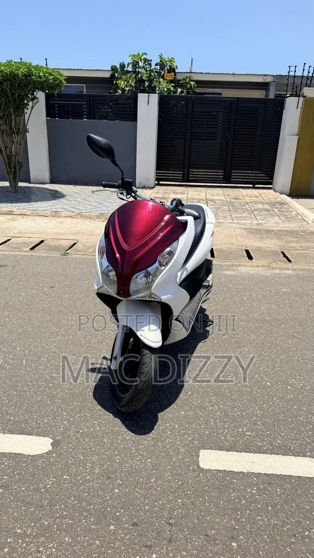 Honda 2016 White · Photo 1