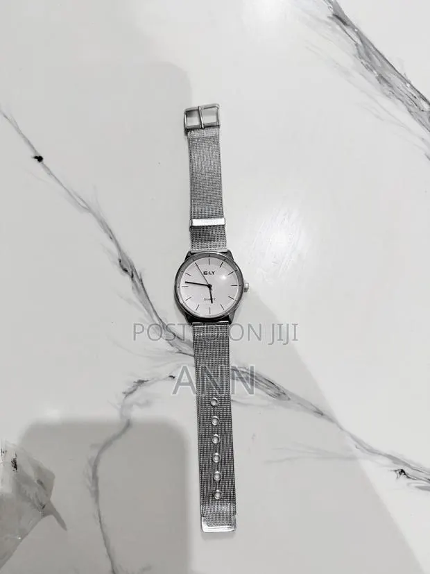 Silver and Pink Watch · Photo 1