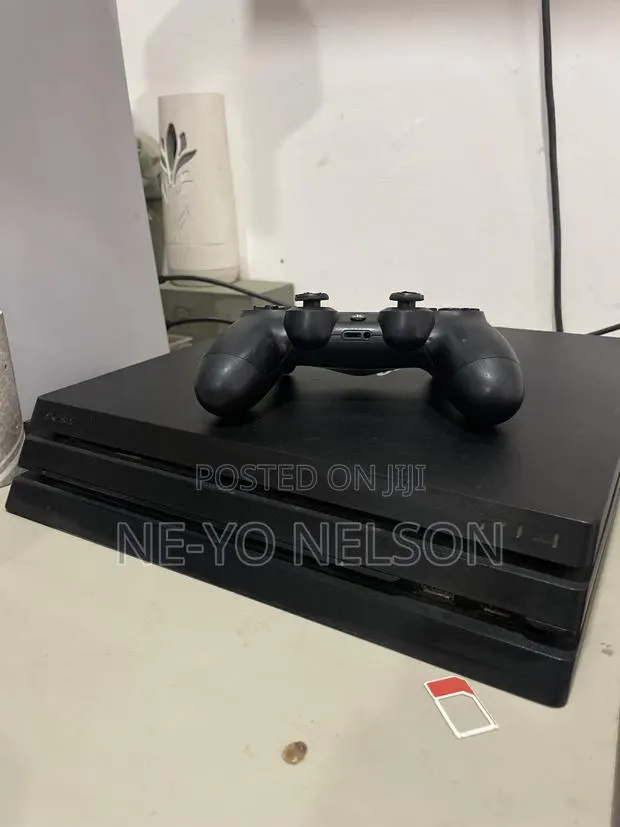 Clean UK Used Sony PlayStation 4 Pro 1TB With Controller · Photo 1