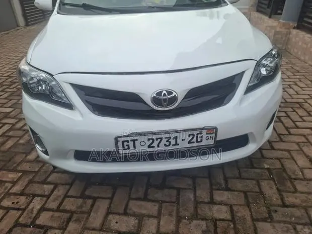 Toyota Corolla 2010 White · Photo 1