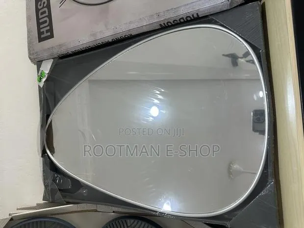 Silver Frame Pebble Mirror Tear Drop Shape Abstract Wall Mirror 60cm · Photo 1
