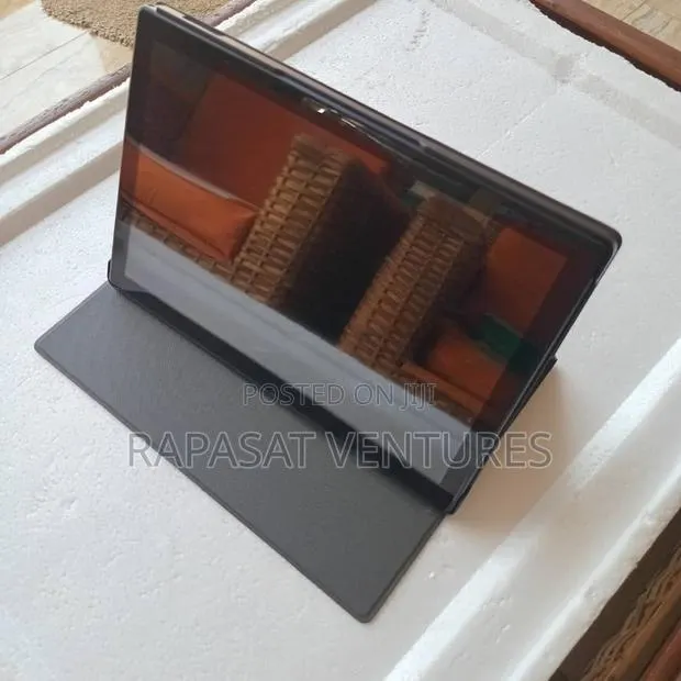 New Tablet 128 GB Black · Photo 1