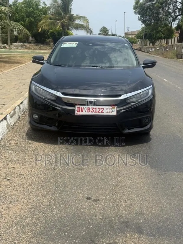 Honda Civic Touring 4dr Sedan (1.5L 4cyl) 2017 Black · Photo 1