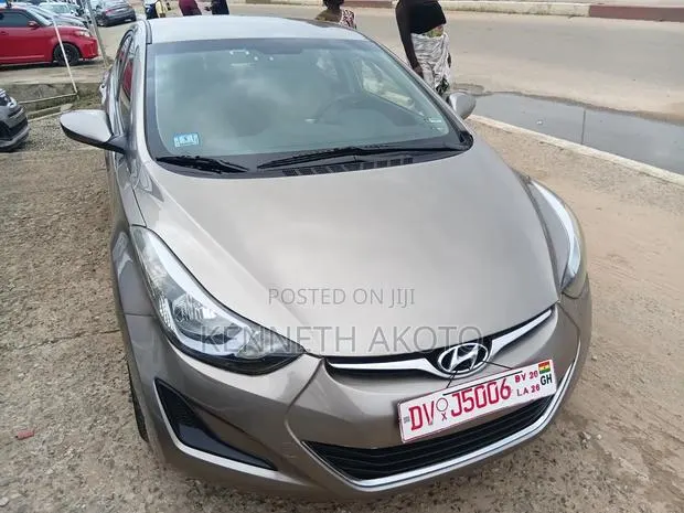 Hyundai Elantra Limited Sedan FWD (1.8L 4cyl 6A) 2016 Gold · Photo 1