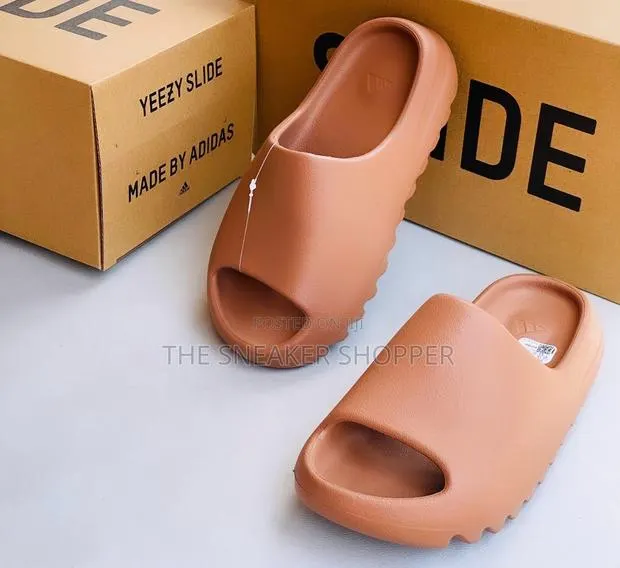 Adidas Yeezy Slides Available · Photo 1