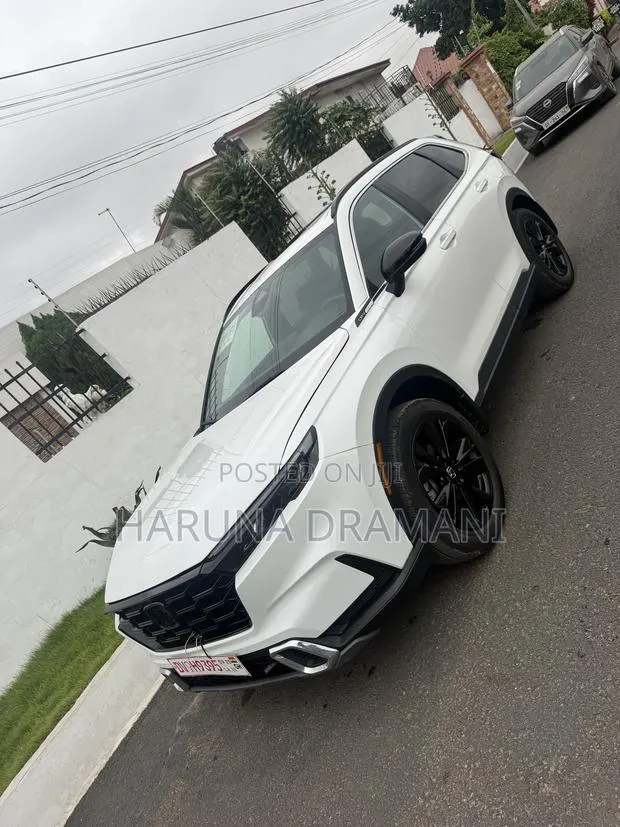 Honda CR-V Sport Touring Hybrid AWD 2026 White · Photo 1
