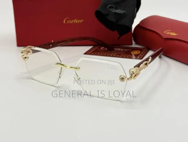 Plain Cartier Rimless Glasses With Wooden Temples And A Gold-tone Pan · Photo 1