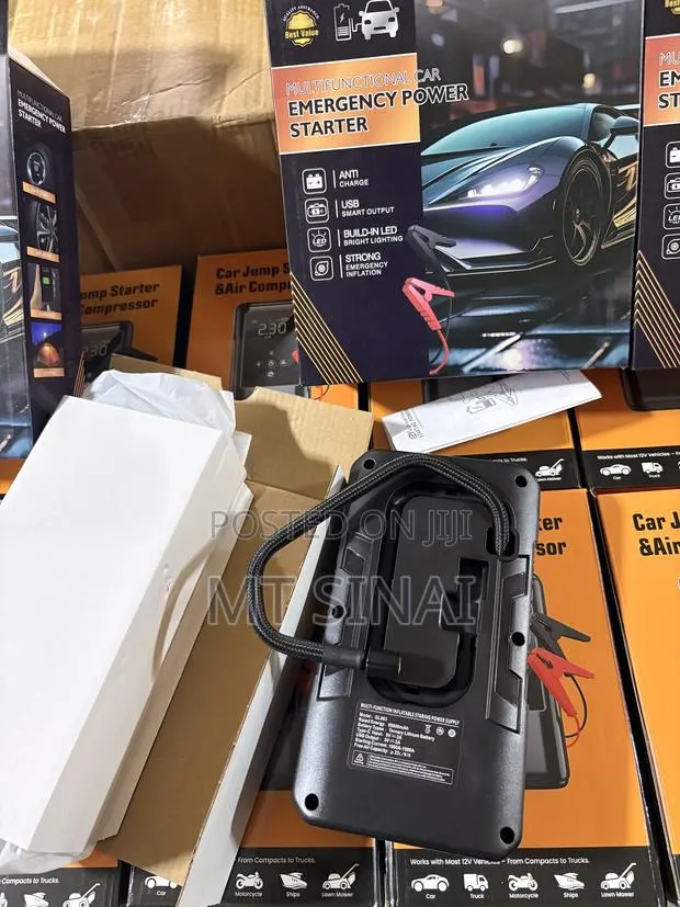 Car Jump Starter With a Car Tire Pump · Photo 1