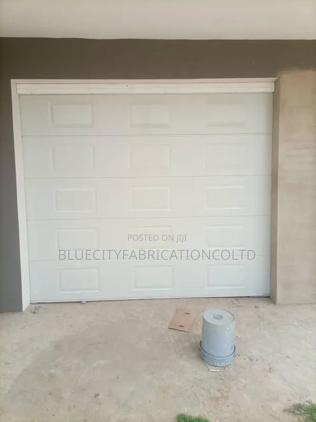 White Automated Garage Door · Photo 1