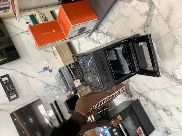Newest Version 50x50 Volcano 2 Gas + 2 Electric Cooker · Photo 1