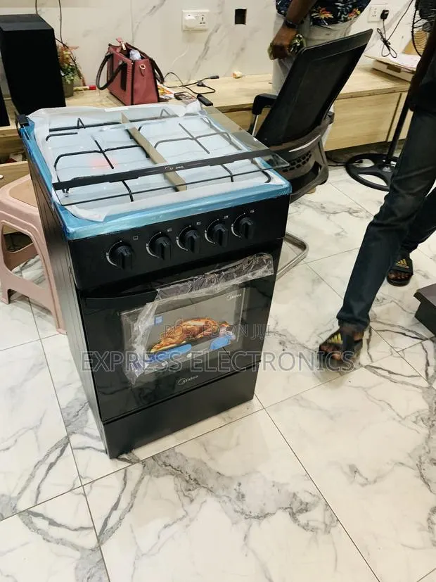 Available Now at Store Gas Cooker Oven Grill 4burger Midea · Photo 1