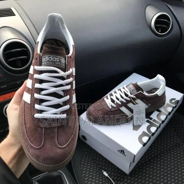 A Pair of Brown and White Adidas Handball Spezial Sneakers · Photo 1