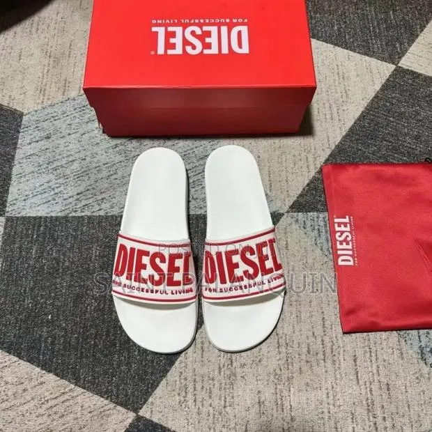 Pair of White Diesel Sa-Mayemi Slide Sandals With Prominent Red Logo · Photo 1