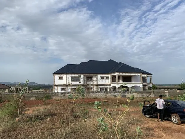 Buy 1 Plot of Land in a Prime Location ( Afienya Toll Booth) · Photo 1