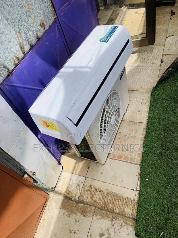 Text Us for Your Nasco 1.5hp Split R410 Has White Air Conditioner · Photo 1