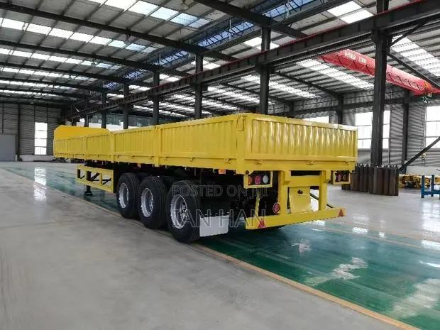 Stake Drop-Side Sidewall Transport Truck Semi-Trailer · Photo 1