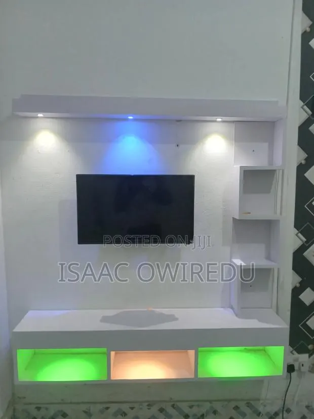 Television Wall Mount Design With Multi Lighting System · Photo 1