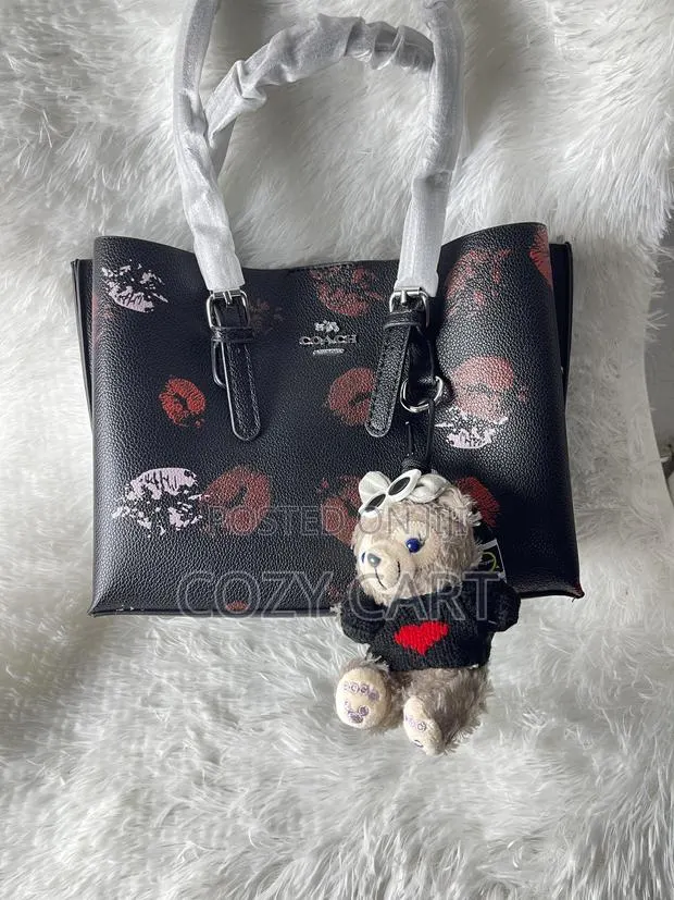 Coach Bag With Teddy Bear Charm · Photo 1