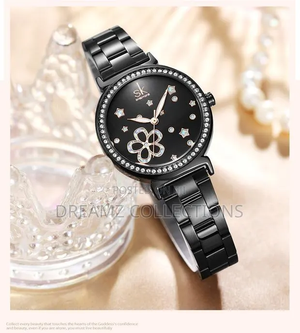 Crystal Bezel Floral Dial Watch · Photo 1