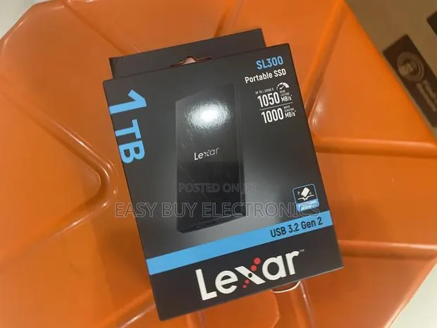Includes Adpaters and Case Hard Drive 1TB · Photo 1