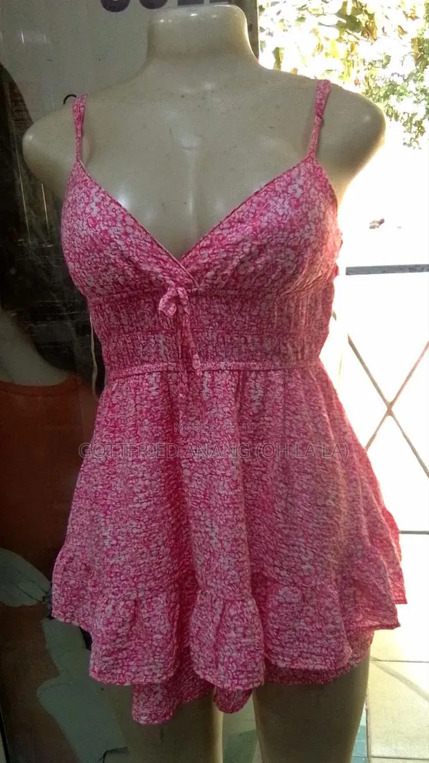 Romper W /Ruffled Skirt · Photo 1
