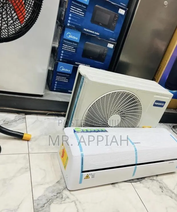 Efficient Nasco 1.5hp Ac(White)R410 Gas · Photo 1