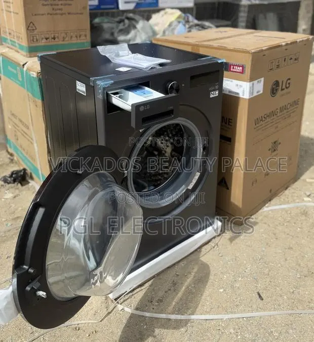 Lg 13kg/8kg Front Load Washer/Dryer · Photo 1